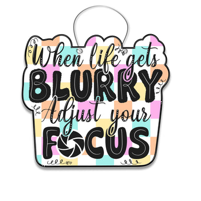 When Life gets Blurry, Adjust Your Focus Door Hanger