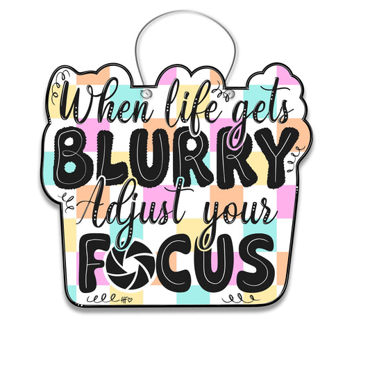 When Life gets Blurry, Adjust Your Focus Door Hanger